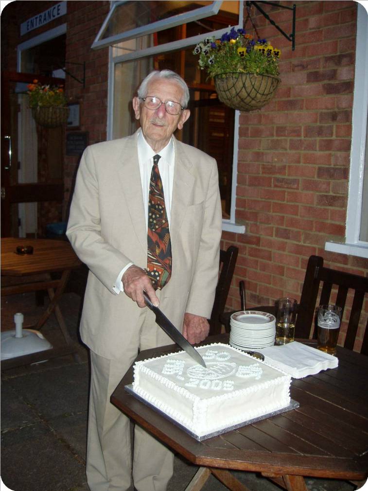 Peter cuts his cake